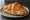 Croissant Sandwich: an illustration of ham, cheese and butter on croissant.