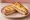 Croque-Hawaïen: an illustration of ham, pineapple, gruyère, béchamel and more on white bread.
