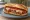 Cudighi Sandwich: an illustration of mozzarella on burger bun.