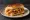 Dabeli: an illustration of potato and butter on bread.