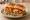 Dabeli Cheese: an illustration of potato and cheese on bread.