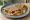 Derbyshire Oatcake: an illustration of cheese and bacon.