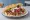 Döner im Fladenbrot: an illustration of beef, chicken, lettuce, cabbage and more.