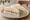 Dosirak Sandwich (도시락 샌드위치): an illustration of ham, egg, cucumber and mayonnaise on white bread.