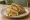 Double Egg Roll: an illustration of egg, onion and chutney on naan.