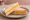 Double Gloucester Sandwich: an illustration of butter on white bread.