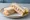 Dressed Crab Sandwich: an illustration of crab, mayonnaise, butter and lemon on white bread.