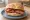 Dry-Cured Bacon Butty: an illustration of bacon and butter.