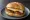 Egg and Sausage: an illustration of egg, sausage and butter.