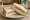 Egg and Tomato: an illustration of egg, tomato, mayonnaise and butter on white bread.