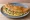 Egg Dosa: an illustration of egg, onion, cilantro and pepper.