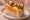 Egg Drop — Bulgogi: an illustration of beef, egg, cheese, mayonnaise and more on brioche.