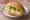 Ei Brötchen: an illustration of egg, mayonnaise, scallion and pepper on bread.