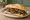 Entraña al Pan: an illustration of beef on baguette.