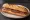 Entrepà d'Anxoves: an illustration of anchovy and tomato on baguette.