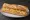 Entrepà de Truita: an illustration of egg, potato and onion on baguette.