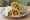 Falafel Wrap: an illustration of chickpeas, hummus, tahini, lettuce and more.