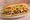 Fat Cat: an illustration of beef, chicken, mozzarella, potato and more on hoagie roll.