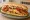 Fat Moon: an illustration of beef, pork, bacon, mozzarella and more on hoagie roll.