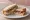Fig and Goat Cheese: an illustration of fig and goat cheese on white bread.