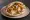Fish and Chips b'Pita: an illustration of fish and potato on pita.