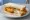Fish Butty: an illustration of fish and butter on white bread.