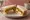 Fish Finger and Mushy Peas: an illustration of fish and butter on white bread.