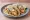 Fish Taco: an illustration of fish, cabbage and coleslaw on tortilla.