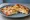 Focaccia col Formaggio: an illustration of cheese on focaccia.