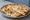 Focaccia di Recco con Formaggio: an illustration of the sandwich.