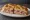 Focaccia Garnie: an illustration of ham on focaccia.