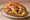Fricassée (פריקסה): an illustration of tuna, egg, potato, harissa and more on bread.