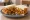 Frito Pie Sandwich: an illustration of beef, pepper, cheddar cheese and onion on white bread.