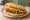 Fry Bread Sandwich: an illustration of beef, beans, lettuce, tomato and more.