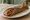 Galette-Saucisse Moutarde: an illustration of sausage and mustard.
