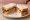 Gammon Sandwich: an illustration of butter and mustard on white bread.