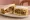 Genghis Khan Sando (ジンギスカンサンド): an illustration of lamb, cabbage, onion and maggi seasoning sauce on shokupan.