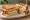 Gilgeori Toast — Chicken Katsu: an illustration of chicken, egg, cabbage, american cheese and more on white bread.