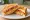 Gilgeori Toast — Kimchi: an illustration of egg, kimchi, cabbage, american cheese and more on white bread.