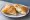 Gnocco Fritto con Squacquerone: an illustration of the sandwich.