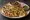 Gobi Kulcha: an illustration of onion, cilantro, garlic and pepper.