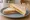 Golden Syrup Sandwich: an illustration of butter on white bread.