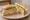 Gōngsī Sānmíngzhì (公司三明治): an illustration of ham, egg, chicken, lettuce and more on white bread.
