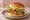 Goobne Chicken Sandwich: an illustration of chicken, mayonnaise, lettuce and pickle on burger bun.
