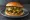 Green Chile Cheeseburger: an illustration of beef, cheese, onion, lettuce and more on burger bun.
