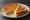 Grilled Cheese: an illustration of american cheese, cheddar cheese and butter on white bread.