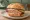Grober Leberkäse: an illustration of pork, beef and mustard on bread.