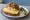 Halver Hahn: an illustration of gouda, mustard, butter and onion.