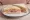 Ham and Mustard: an illustration of ham, mustard and butter on white bread.