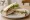 Ham Salad Sandwich: an illustration of ham, lettuce, tomato, cucumber and more on white bread.